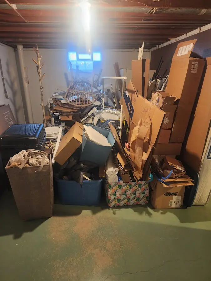 Roll-off dumpster container at job site for 15 Yard Dumpster Rental in Nutley